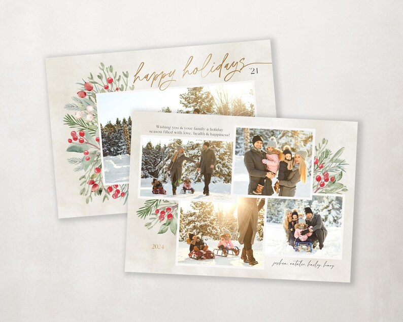 May include: A Christmas card with a wintery scene featuring a family of four in a snowy forest. The card has a wreath with red berries and green leaves around the edges. The text "happy holidays 2021" is written in gold script at the top of the card. The text "Wishing you & your family a holiday season filled with love, health & happiness" is written in black script at the bottom of the card.