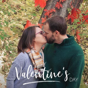 May include: A couple kissing in front of a tree with red leaves. The text "HAPPY VALENTINE'S DAY" is written in white on the bottom of the image.
