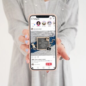 May include: A smartphone displaying a social media post announcing the birth of a baby boy. The post includes a blue and white letter board with the text "It's a Boy Baby Johnson arriving February 2022".
