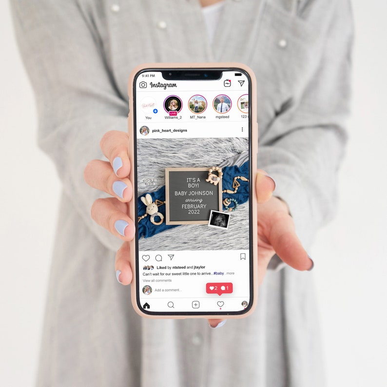May include: A smartphone displaying a social media post announcing the birth of a baby boy. The post includes a blue and white letter board with the text "It's a Boy Baby Johnson arriving February 2022".