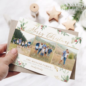 May include: A Christmas card with a gold and white background featuring a watercolor design of green leaves and red berries. The card has three photos of a family, with the text "Merry Christmas" and "The Miller Family" in gold lettering.