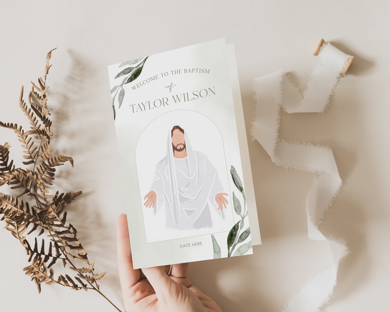 May include: A baptism invitation card with the text "Welcome to the Baptism of Taylor Wilson." The card features an illustration of a figure in white robes with outstretched arms, framed by an arch and green foliage.