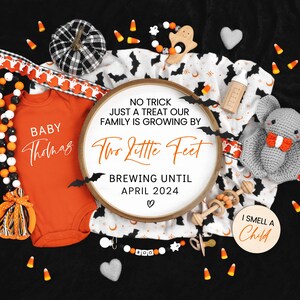 May include: A Halloween-themed baby announcement with a white and black pumpkin, a crocheted bat, a wooden rattle, and a baby onesie with the text "Baby Thomas". The announcement also includes a wooden sign with the text "No trick just a treat our family is growing by two little feet brewing until April 2024".