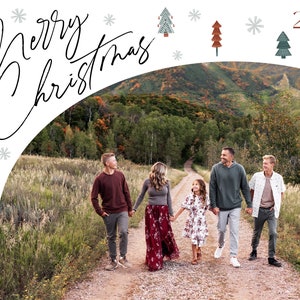 May include: A family of five walks down a path in a forest setting. The family is dressed in casual clothing and smiling. The text "The Jackson Family" and "Merry Christmas 2023" is written on the image.