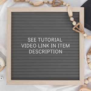Puede incluir: Un tablero de letras gris con un marco de madera blanco. El tablero tiene letras blancas que deletrean "SEE TUTORIAL VIDEO LINK IN ITEM DESCRIPTION".