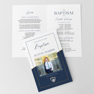 May include: A baptism program with a photo of a young person in a blue blazer and tie. The program has a navy blue and gold design with the text "Welcome to the Baptism of Justin Harris". Lyrics and other details are also included.