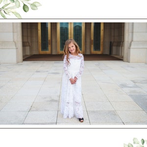 May include: A young girl wearing a white lace dress stands in front of a building with large golden doors. She is smiling and looking at the camera.