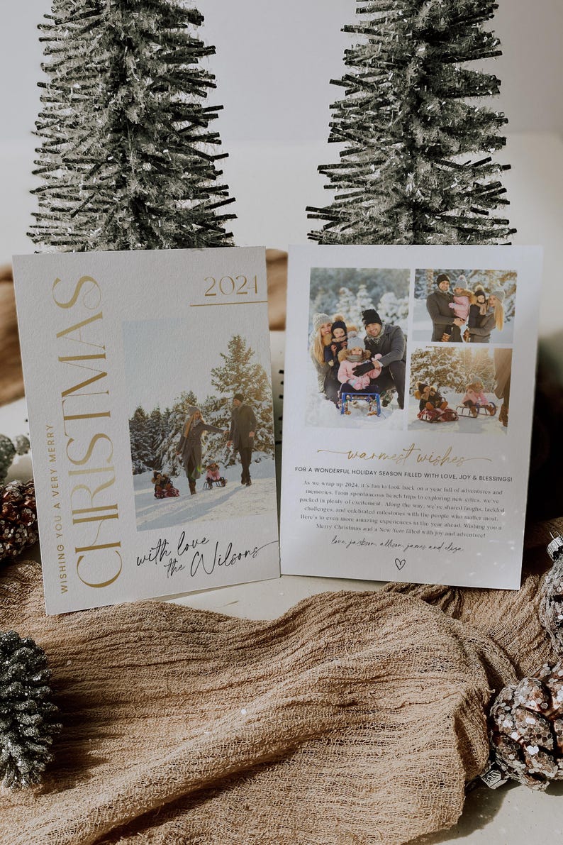 May include: A Christmas card with a gold and white design. The card features a photo of a family in a snowy setting. The text on the card reads "Wishing you a very merry Christmas with love, the Wilsons".