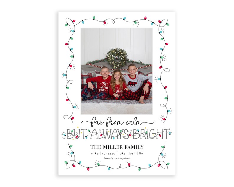 May include: A Christmas card featuring a family of three in matching pajamas, with a string of lights around the border. The text reads "far from calm BUT ALWAYS BRIGHT THE MILLER FAMILY mike | vanessa | jake | josh | liv twenty twenty-two".