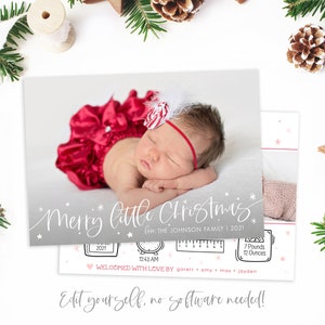 May include: A Christmas card featuring a sleeping baby girl wearing a red dress and a candy cane headband. The card has a gray background with white snowflakes and the text "Merry Little Christmas" and "The Johnson Family | 2021". The bottom of the card has a pink heart, a clock, a ruler, and a scale with the baby's birth details.