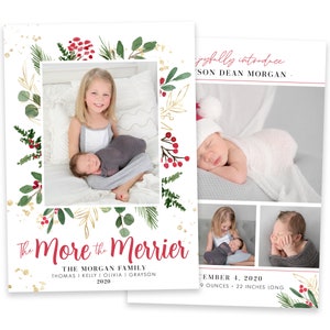 May include: Christmas card with a gold and green floral border and red berries. The card features a family photo with a baby, a toddler, and an older child. The text on the card reads "The More the Merrier" and "The Morgan Family, Thomas, Kelly, Olivia, Grayson, 2020".