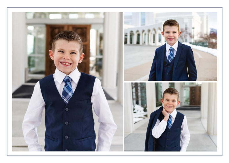 May include: A young boy wearing a navy blue suit with a white shirt and a blue and white plaid tie. He is smiling and looking at the camera. The boy is standing in front of a white building with a large door.