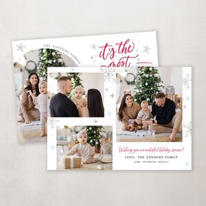 May include: A Christmas card featuring a family of four with a Christmas tree in the background. The card has a white background with silver snowflakes and stars. The text on the card reads "It's the most..." and "Wishing you a wonderful holiday season! Love, The Sanders Family, Josh, Michelle, Allanor".
