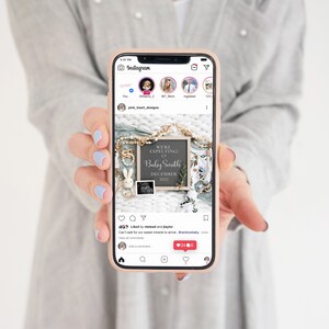 May include: A smartphone screen displaying an Instagram post announcing a pregnancy with the text "We're expecting a Baby Smith December 2022". The post includes a photo of a chalkboard sign with the announcement, a baby onesie, and a wooden bunny rattle.