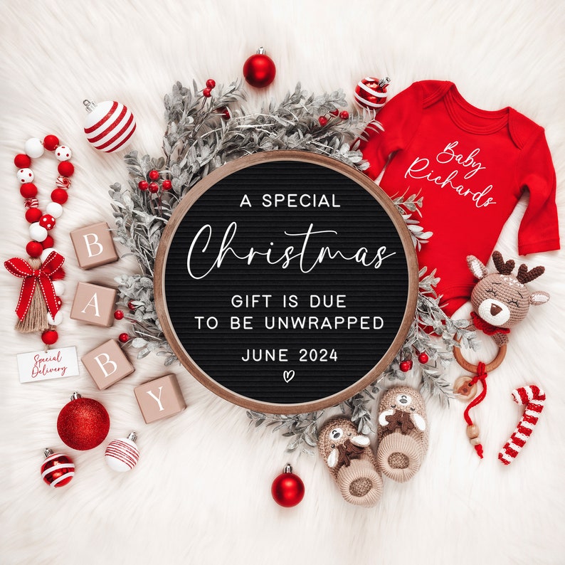 May include: A black letter board with the text "A Special Christmas Gift is Due to Be Unwrapped June 2024" surrounded by red and white ornaments, a red onesie with the text "Baby Richards", and a brown and white stuffed animal.