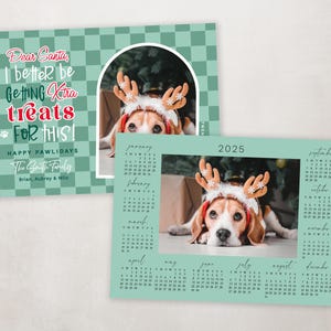 May include: A holiday-themed greeting card and calendar featuring a beagle wearing reindeer antlers. The card has text that reads "Dear Santa, I better be getting extra treats for this!" and "Happy Pawlidays". The calendar is for the year 2025.