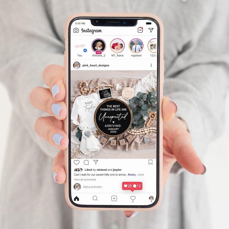May include: A black and gold round sign with the text "The best things in life are unexpected" and "Arriving January 2024". The sign is surrounded by a white onesie with the text "Baby Taylor" on it, a white stuffed animal, and wooden blocks that spell out "Baby".