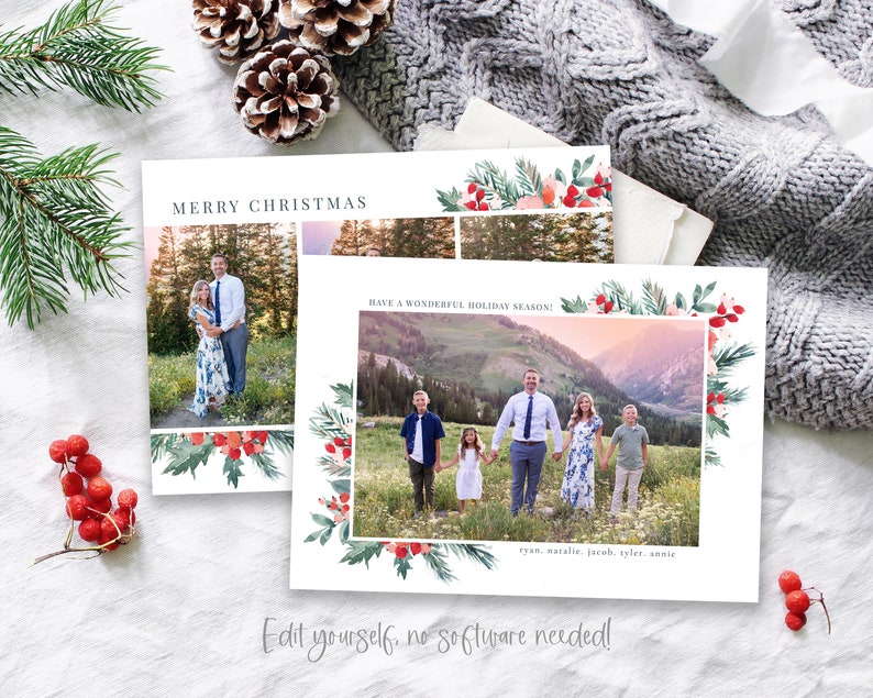 May include: A Christmas card with a watercolor border of greenery and red berries. The card features a family photo of five people standing in a snowy mountain landscape. The text "Merry Christmas" and "Have a Wonderful Holiday Season!" is printed on the card. The names "Ryan, Natalie, Jacob, Tyler, Annie" are printed at the bottom of the card. The text "Edit yourself, no software needed!" is printed below the card.