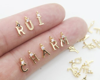 26 unids/set dijes de letra inicial de circón chapado en oro Real, dije de letra pavimentada cz, dijes de letra pequeña, pulsera de palabras/collar Diy, búsqueda de letras