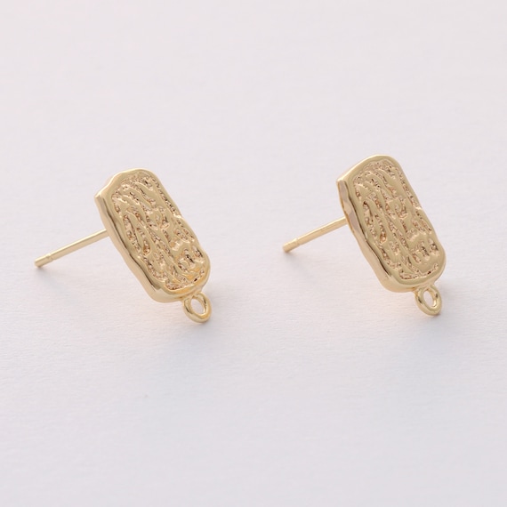 Orecchini di forma rettangolare in oro bianco 18k. | GV