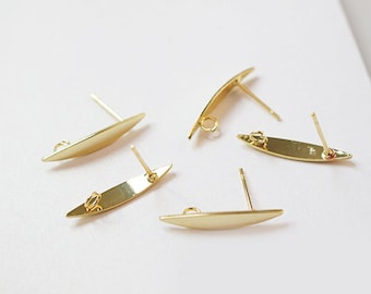May include: Five gold-toned earring findings with a flat, oval-shaped base and a post for attaching earrings. The findings have a loop on the back for attaching a jump ring.