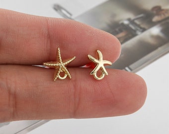 May include: Two gold-colored starfish charms with a jump ring for attaching to jewelry or other crafts.