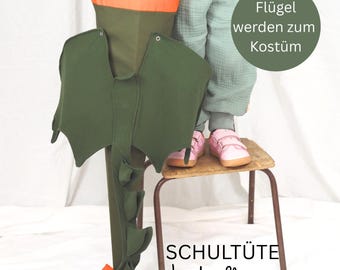 Dragon-themed school cone | Fabric school cone including cardboard insert | Converts into a cuddly pillow & costume | Dragon wings | Olive green | Name tag available