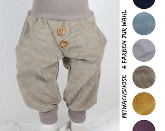 Corduroy button trousers to grow with, six colours to choose from: ice blue, sand, grey, plum, dark blue, golden brown