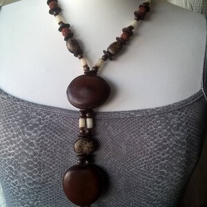 Ethnic necklace in tropical seeds image 8