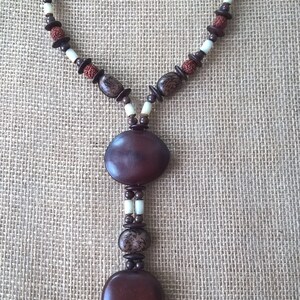 Ethnic necklace in tropical seeds image 5