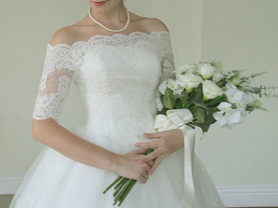 Bridal off shoulder lace bolero jacket /shrug/ 3/4 sleeve wedding gown Bridal off shoulder lace bolero jacket /shrug/ 3/4 sleeve wedding gown
