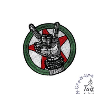 May include: Embroidered patch with a green circle, a red star, and a silver robot hand making the rock and roll hand gesture.