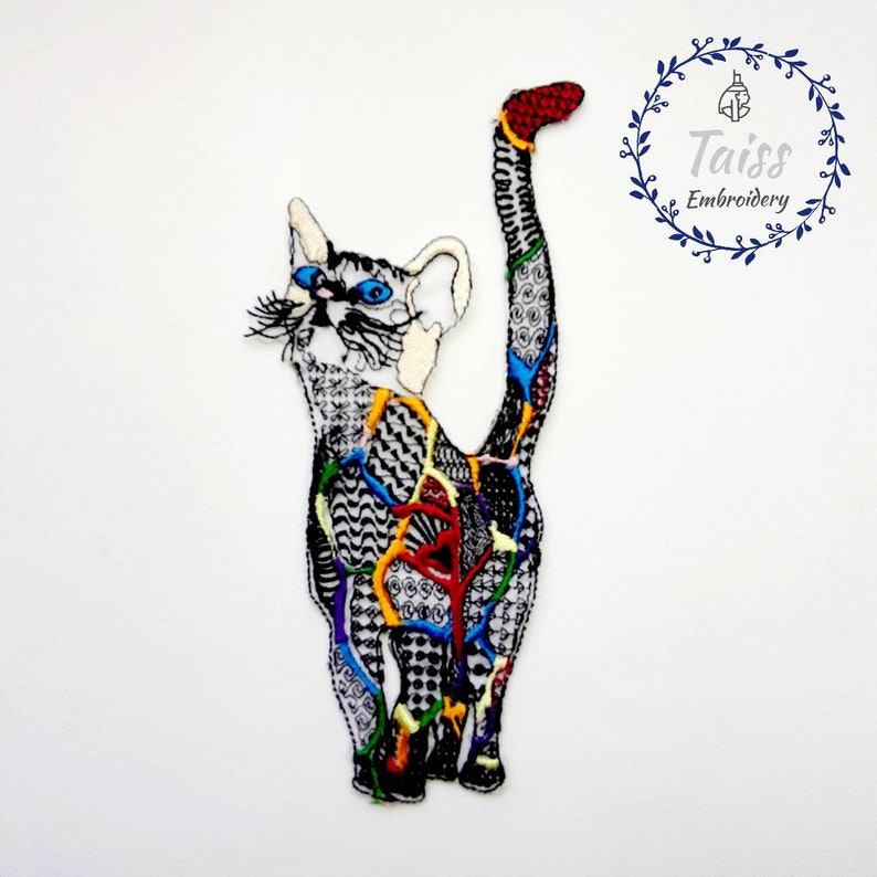 May include: A colorful embroidered cat patch with a black and white patterned design. The cat is standing with its tail raised in the air. The patch is perfect for adding a unique touch to clothing, bags, or other accessories.