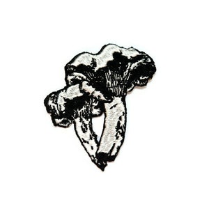 May include: Black and white embroidered patch of two mushrooms.
