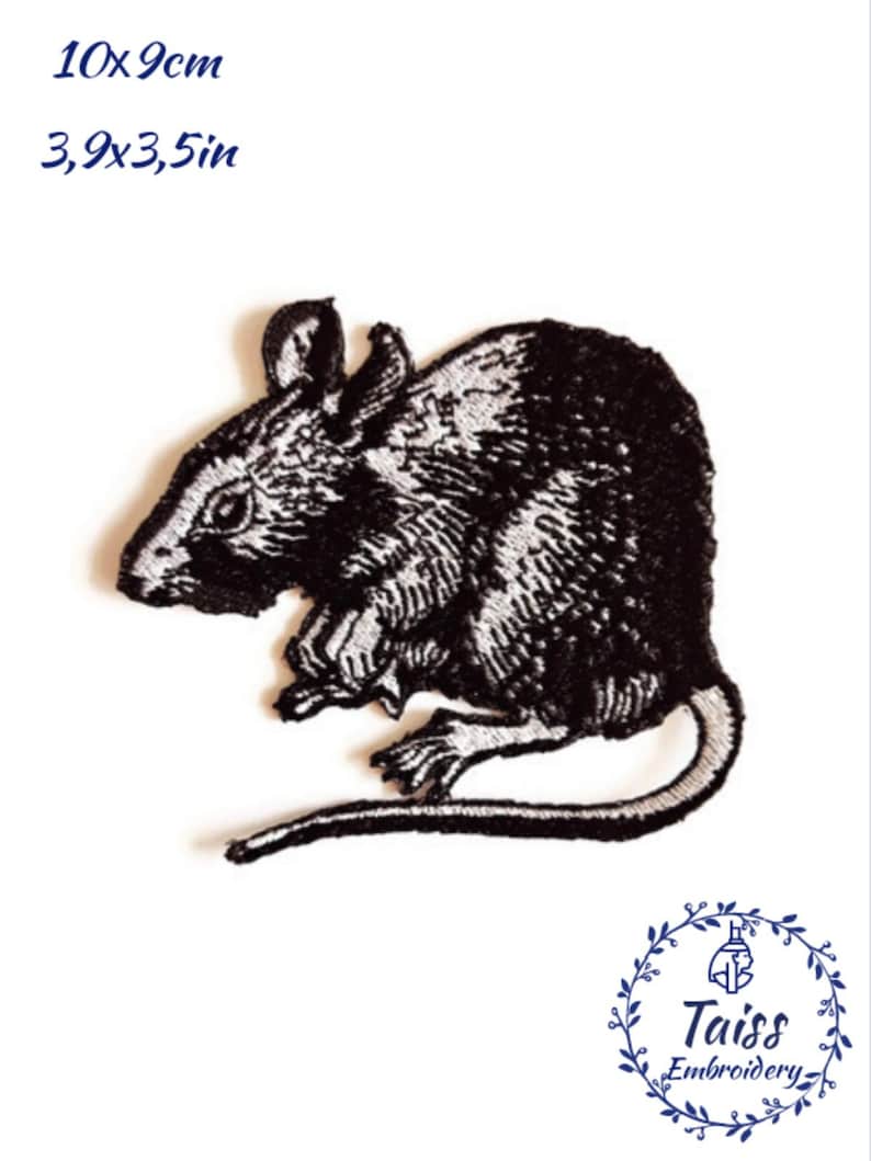 May include: Black and white embroidered iron-on patch of a rat, measuring 3.9 x 3.5 inches. The patch is designed to be sewn or ironed onto fabric.