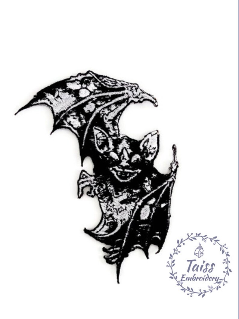May include: Black and white embroidered iron-on patch of a bat with its wings spread out. The bat has a menacing expression and sharp teeth. The patch is ideal for adding a spooky touch to clothing, bags, or other accessories.
