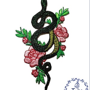 May include: Embroidered iron-on patch featuring a green snake wrapped around pink roses with green leaves.