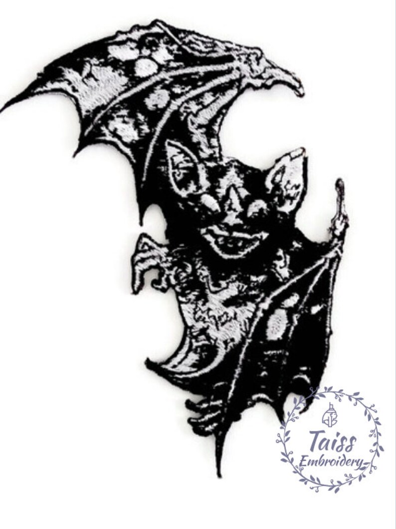 May include: Black and white embroidered iron-on patch of a bat with wings spread out. The bat is in a menacing pose with its fangs showing. The patch is perfect for adding a spooky touch to clothing, bags, or other accessories.