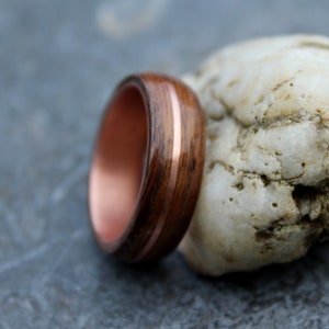 Rosewood ring on copper ring