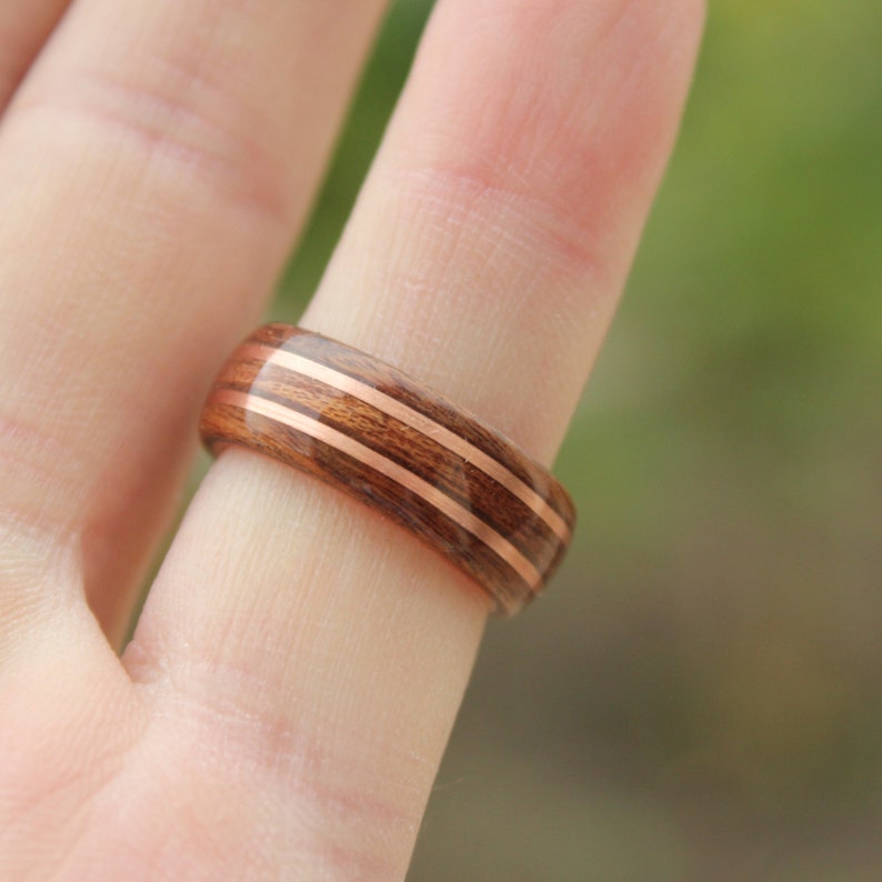 Rosewood and mahogany ring on copper ring