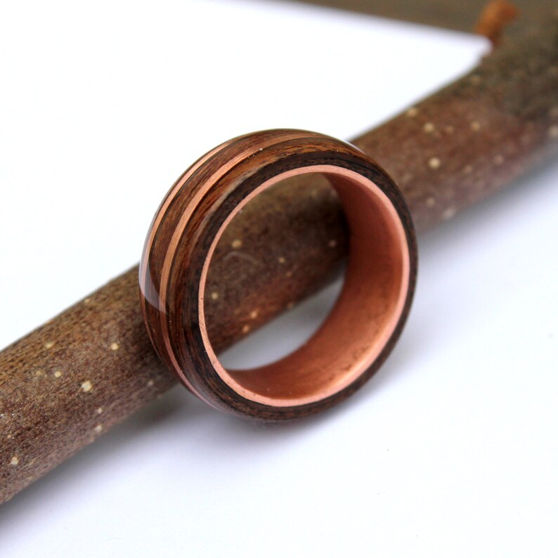 Rosewood and mahogany ring on copper ring