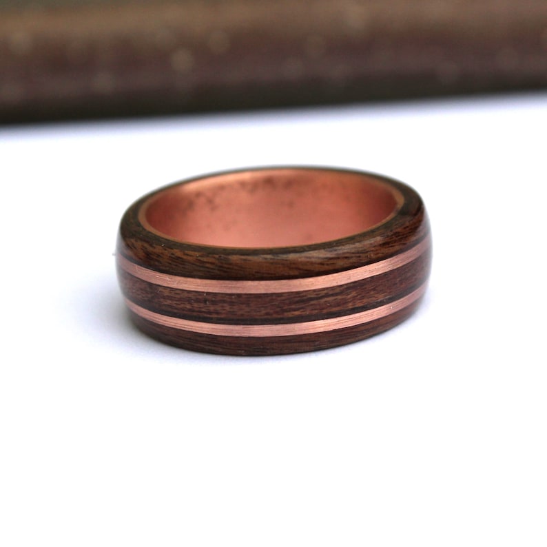 Rosewood and mahogany ring on copper ring