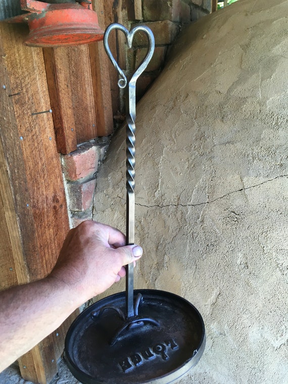 Dutch oven lid lifter for campfire cooking 