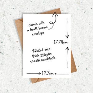 May include: A white card with black text and measurements of 17.78cm x 12.7cm, accompanied by a kraft brown envelope. The card is printed on thick 350gsm smooth cardstock. Text on the card reads: "comes with a kraft brown envelope" and "Printed onto thick 350gsm smooth cardstock."