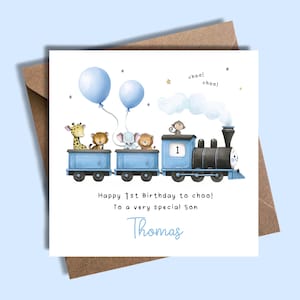 May include: A birthday card featuring a blue train with animal passengers and two blue balloons. The card reads "Happy 1st Birthday to choo! To a very special Son Thomas."