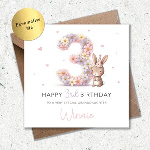 May include: A birthday card with a floral number 3, a bunny wearing a party hat, and the text "Happy 3rd Birthday". The card is personalized with the name "Winnie". The card is on a brown envelope with a gold sticker that says "Personalise Me".