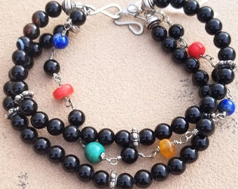 8-1/2" Black Onyx 3-Strand Bracelet