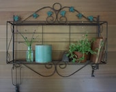Collapsible Metal Potting Shed Shelf or Plant Stand with Faded Green Leaf Detail