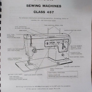 May include: A black and white diagram of a Singer sewing machine, class 457, with labels highlighting its features. The diagram shows the machine's top cover, throat plate, needle position lever, bobbin winder, stitch length control, and feed throw-out knob.