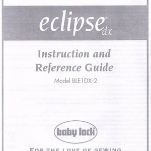 May include: A gray and white instruction manual for the Baby Lock Eclipse DX sewing machine. The manual has the title "Instruction and Reference Guide" and the model number "BLE1DX-2".